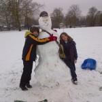 snowman_tom_lottie_macintyre Tom and Lottie MacIntyre with their creation in Higginson Park. Nice job!